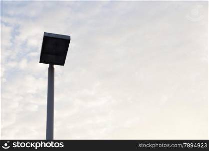 Recessed lighting in public. In the background is the sky in the evening.