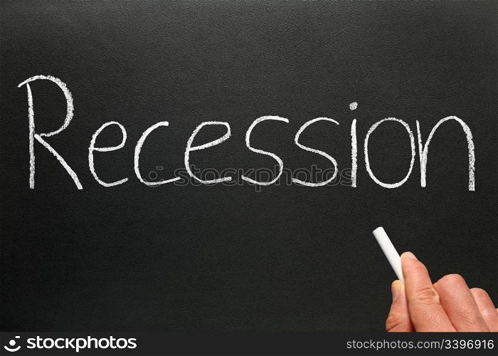 Recession written in chalk on a blackboard.