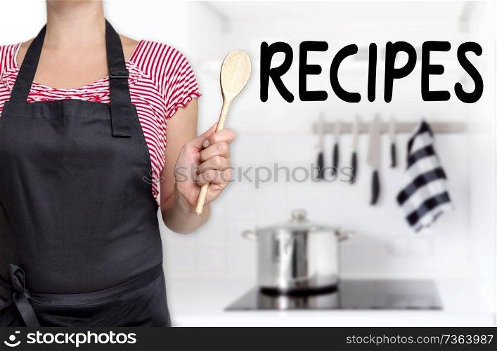 Recipes cook holding wooden spoon background.. Recipes cook holding wooden spoon background