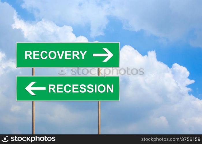 recovery and recession on green road sign with blue sky