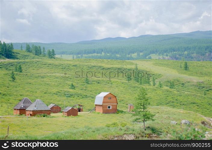 Recreation area in Altai mountains with home Russia