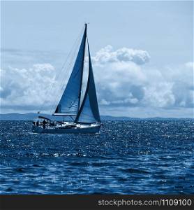 Recreational Yacht in the Adriatic Sea. Color of the year 2020 classic blue toned