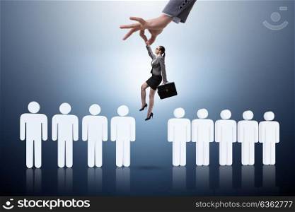 Recruitment concept with hand picking the best employee. The recruitment concept with hand picking the best employee