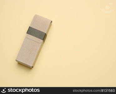 Rectangular brown corrugated box for packing goods, perfumes, creams and cosmetics