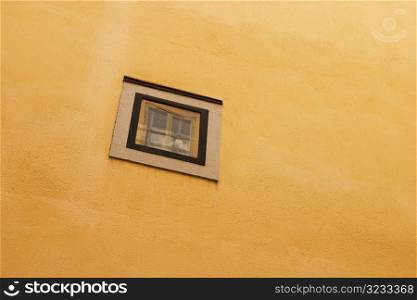 Rectangular window on yellow brick wall