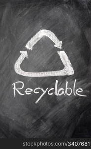 Recyclable sign drawn on a blackboard
