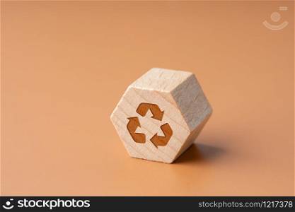 Recycle icon on Hexagon wood block