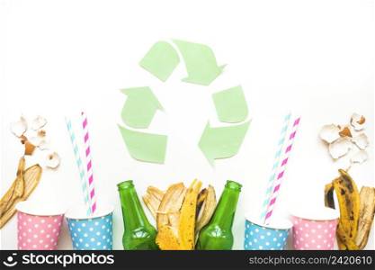 recycle logo with garbage