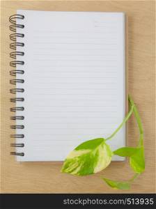 recycle notebook on wood background