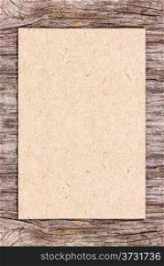 Recycle paper on wooden background. Can be used for your text