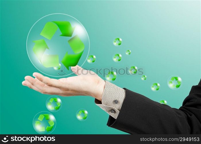 Recycle sign on business hand