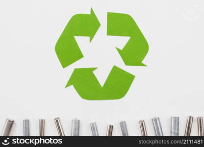 recycle symbol garbage batteries grey background