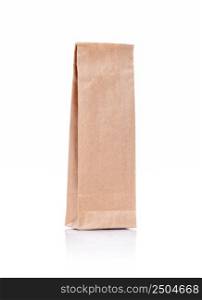 Recycled brown craft paper package for tea or coffee isolated on white background