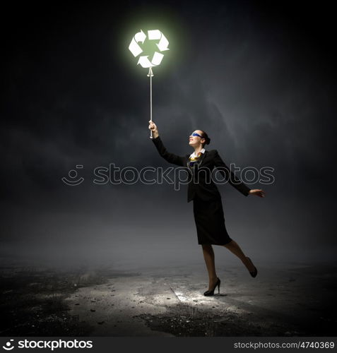 Recycling symbol. Image of businesswoman holding balloon with recycle symbol