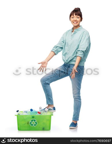 recycling, waste sorting and sustainability concept - smiling young asian woman holding box with plastic bottles over white background. smiling young asian woman sorting plastic waste