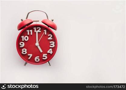 Red alarm clock isolated on white background. Business time conc. Red alarm clock isolated on white background. Business time concept.