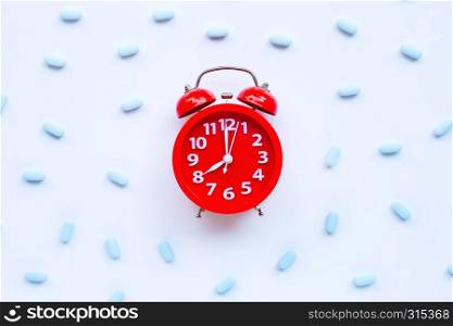 "Red alarm clock ring with "PrEP" ( Pre-Exposure Prophylaxis). used to prevent HIV."
