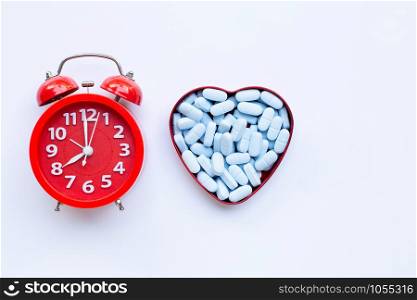 "Red alarm clock ring with "PrEP" ( Pre-Exposure Prophylaxis). used to prevent HIV. Copy space"