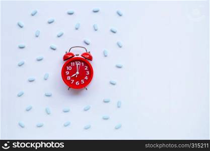 "Red alarm clock ring with "PrEP" ( Pre-Exposure Prophylaxis). used to prevent HIV. Copy space"