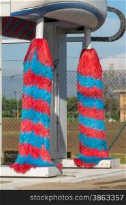 red and blue car wash brush, automated car wash machine