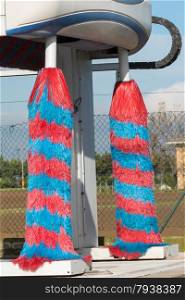red and blue car wash brush, automated car wash machine