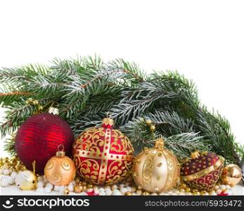 red and golden christmas decorations with evergreen tree border on white background. golden christmas decorations