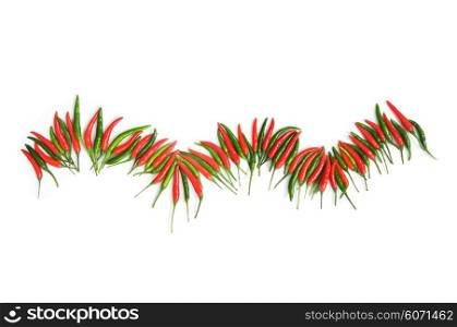 Red and green chili peppers isolated on the white
