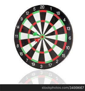 Red and green darts punctured in the center of the target isolated on white background