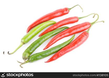 red and green hot chili peppers isolated on white