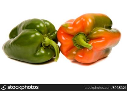 red and green peppers isolated on white