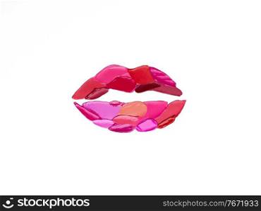 Red and pink lipstick smeared in the shape of lips. Isolated on white background