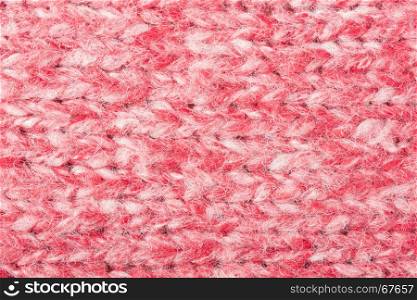 Red and white knitting fabric texture background or knitted pattern background for design. Knitting or knitted. Red knitting. Red knitting background. Red knitting texture