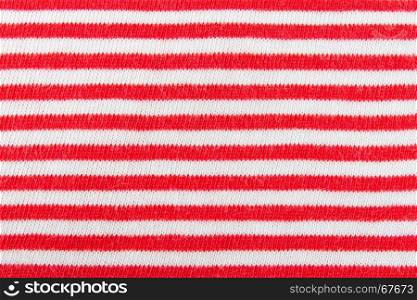 Red and white line knitting fabric texture background or knitted pattern background for design. Knitting or knitted