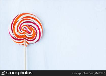 red and white lollipop candy