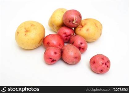 Red and white new small potatoes isolated on a white background. New Potatoes
