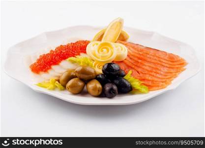 Red and white salted fish in assortment with greenery and lemon