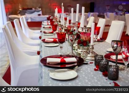Red and White table setting for catering & decor purposes at corporate Christmas Gala Event Party