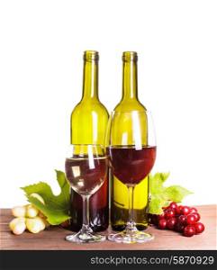 Red and white wine in bottles and glass on the wooden table. Wine in glass