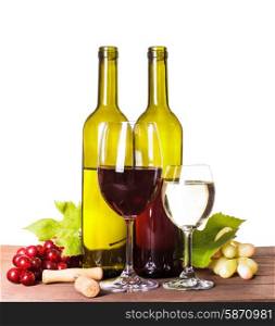 Red and white wine in bottles and glass on the wooden table. Wine in glass