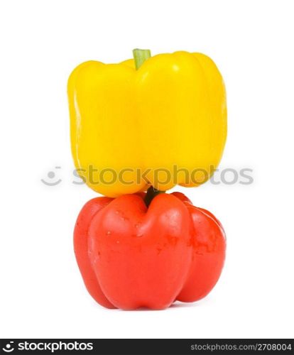 Red and yellow isolated bell pepper with white background.