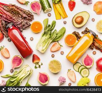 Red and yellow smoothie bottles with organic fruits and vegetables ingredients on white desk background, top view, flat lay. Healthy clean and detox, weight loss dieting or fasting food concept