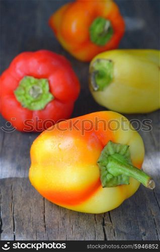 Red and yellow sweet peppers isolated
