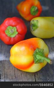 Red and yellow sweet peppers isolated