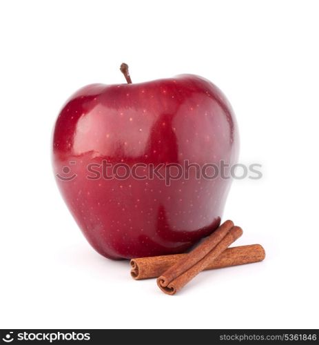 Red apple and cinnamon sticks isolated on white cutout