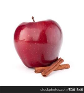 Red apple and cinnamon sticks isolated on white cutout