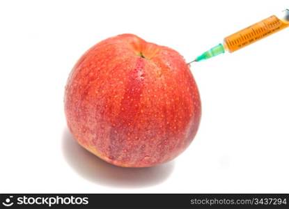 red apple and syringe close-up on white