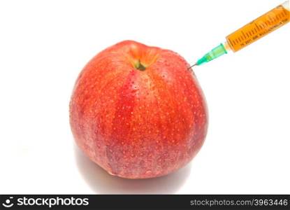 red apple and syringe close-up on white background