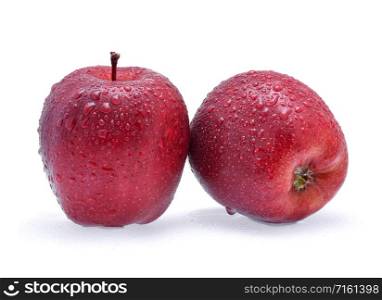 Red Apple with drops of water isolated on white background