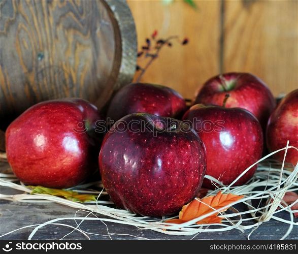 Red apples and wooden basket