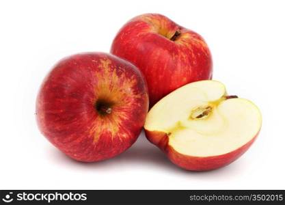 red apples pile slice isolated on white